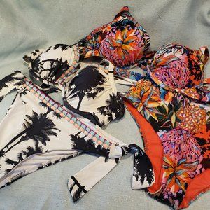 pack of 2 Next 32DD/10uk bikinis and one10UK beachwear shorts.